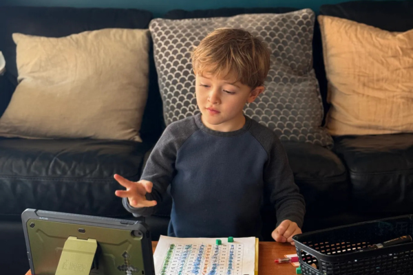 boy_at_table_600x400